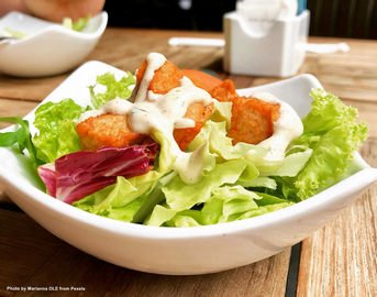 chicken-salad-on-top-of-white-ceramic-plate